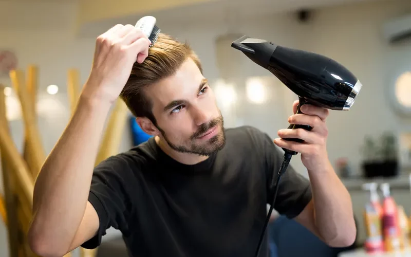 Use a blow dryer to add volume